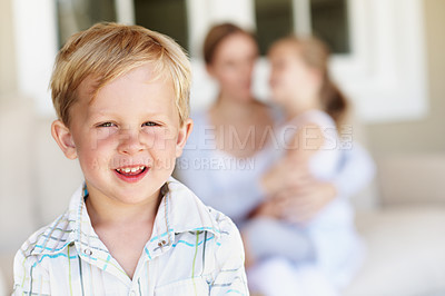 Buy stock photo Happy, relax and portrait of child in home with development, growth or bonding with family in lounge. Smile, calm and boy kid in living room with positive attitude, safety and trust in apartment.