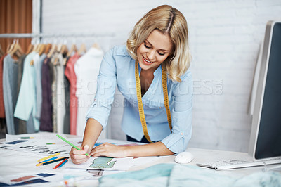 Buy stock photo A young designer creating a design on paper