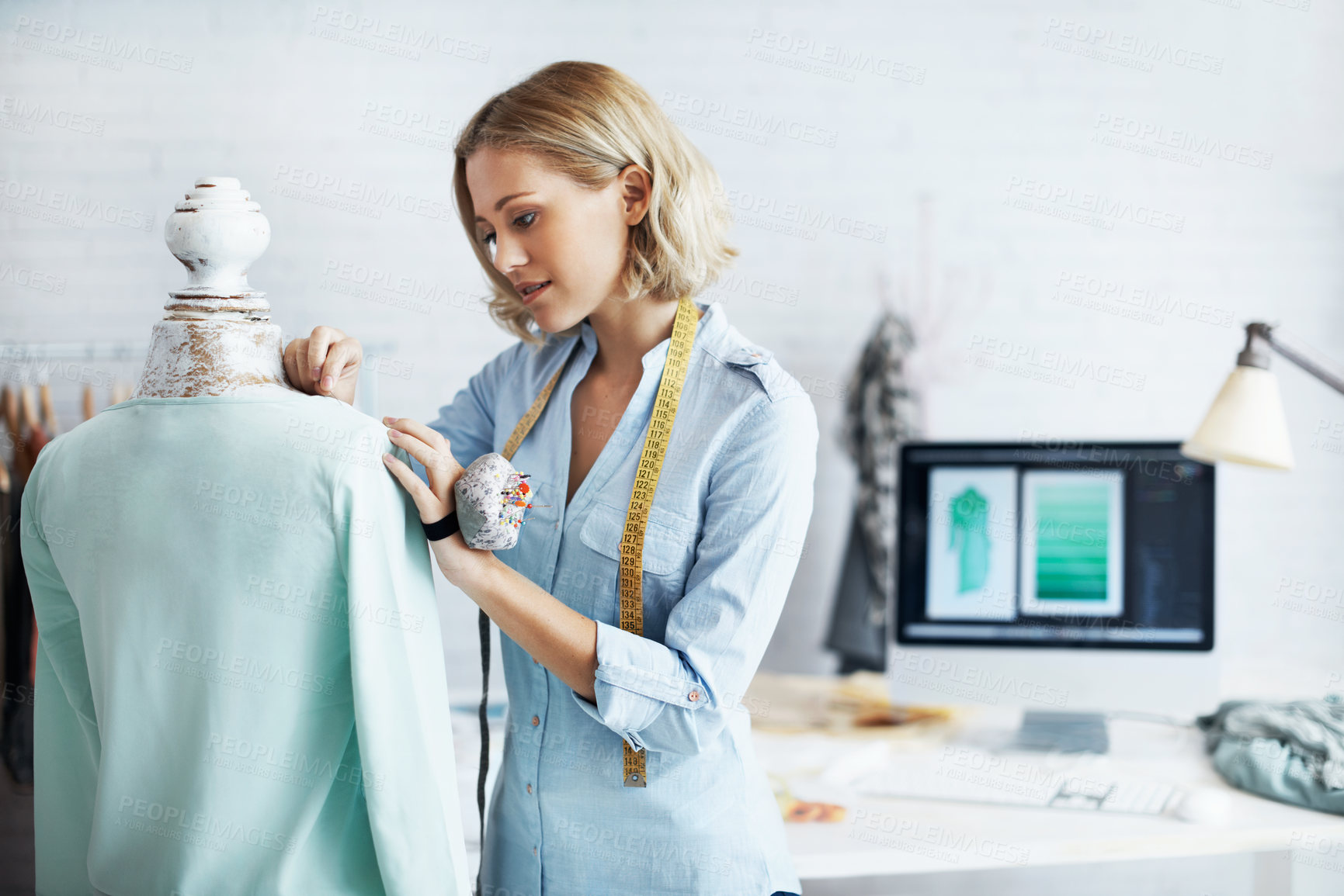 Buy stock photo Pin, material and woman with mannequin in workshop, adjust and fashion designer with measuring tape. Checking, seam and person with sewing project, creative design and tailor with stylish clothes
