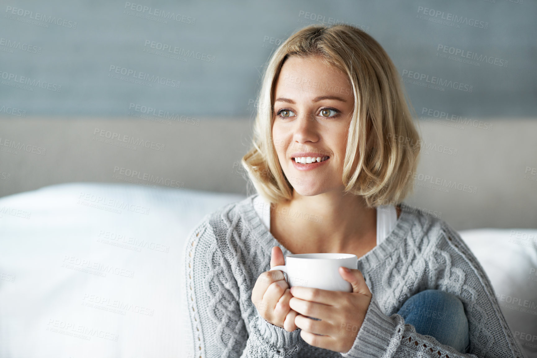 Buy stock photo Woman, thinking and happy with coffee in lounge, thoughts and contemplating decision with hot drink. Remember, good memory and person with warm beverage on weekend, mindset and reflection in house