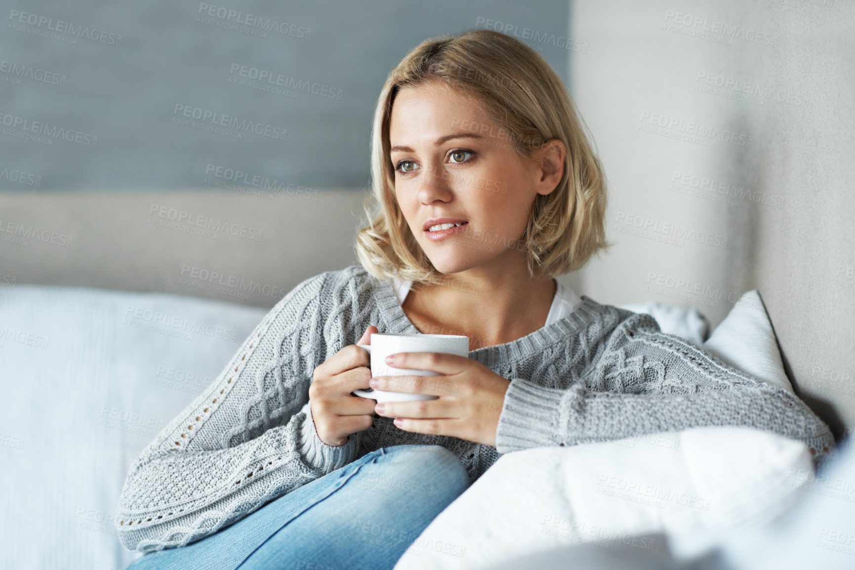 Buy stock photo Woman, thinking and daydream with coffee in lounge, relax and contemplating decision with hot drink. Remember, memory and person with warm beverage on weekend, chill or comfortable with tea in house
