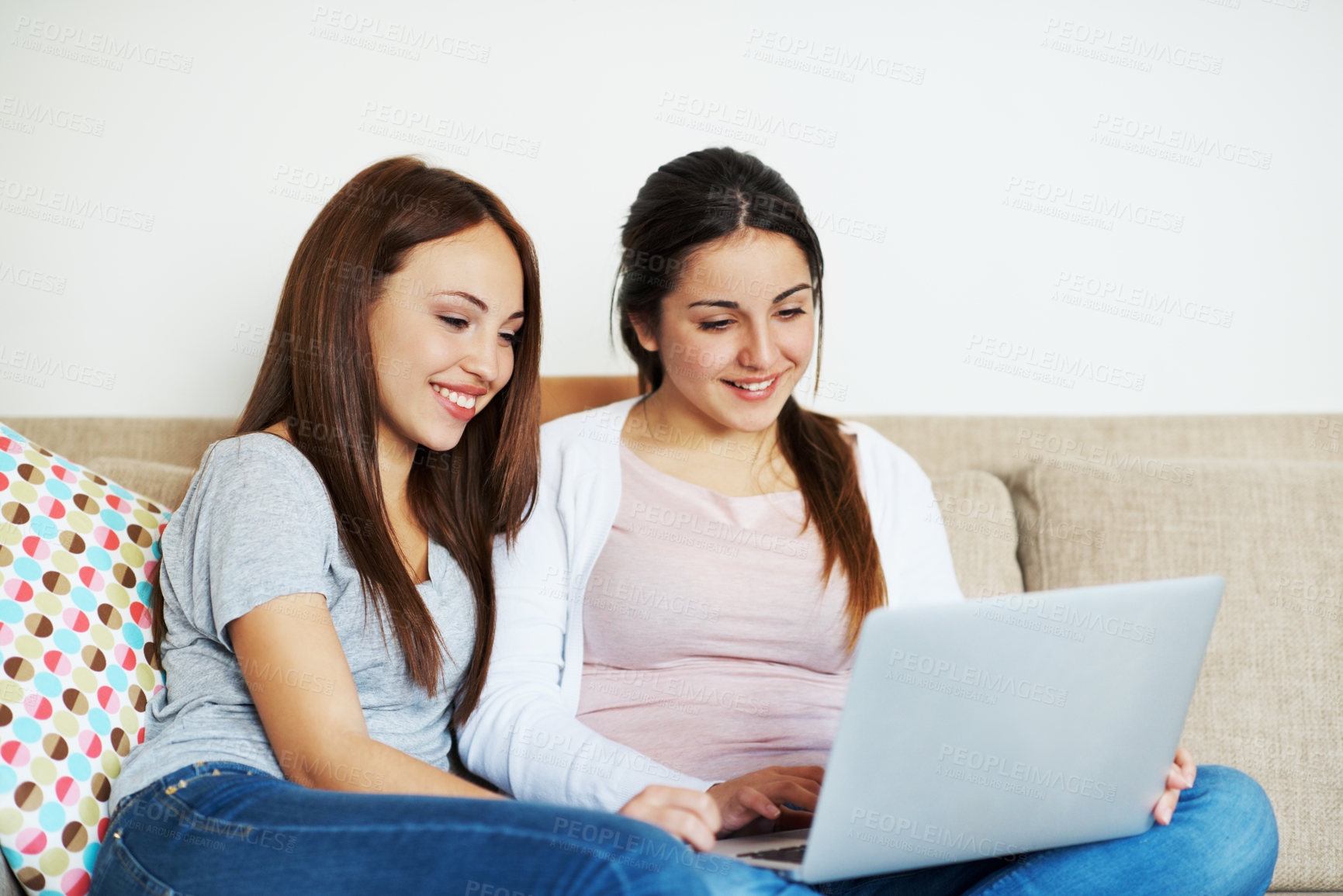 Buy stock photo Friends, smile or teens on sofa with laptop, watching movie or online entertainment in hangout. Space, digital or girls in home with tech, bonding together or series streaming on multimedia platform.