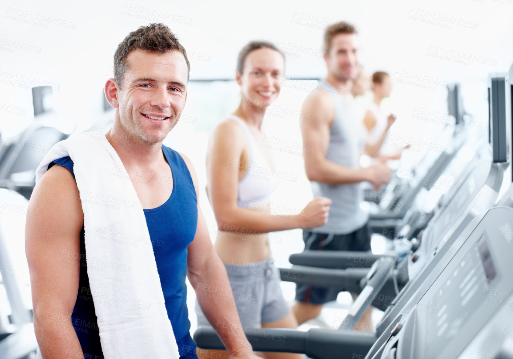 Buy stock photo Fitness, smile and man on treadmill at gym for health, wellness or endurance workout with portrait. Exercise club, cardio machine and happy person with wellbeing, training or practice with instructor