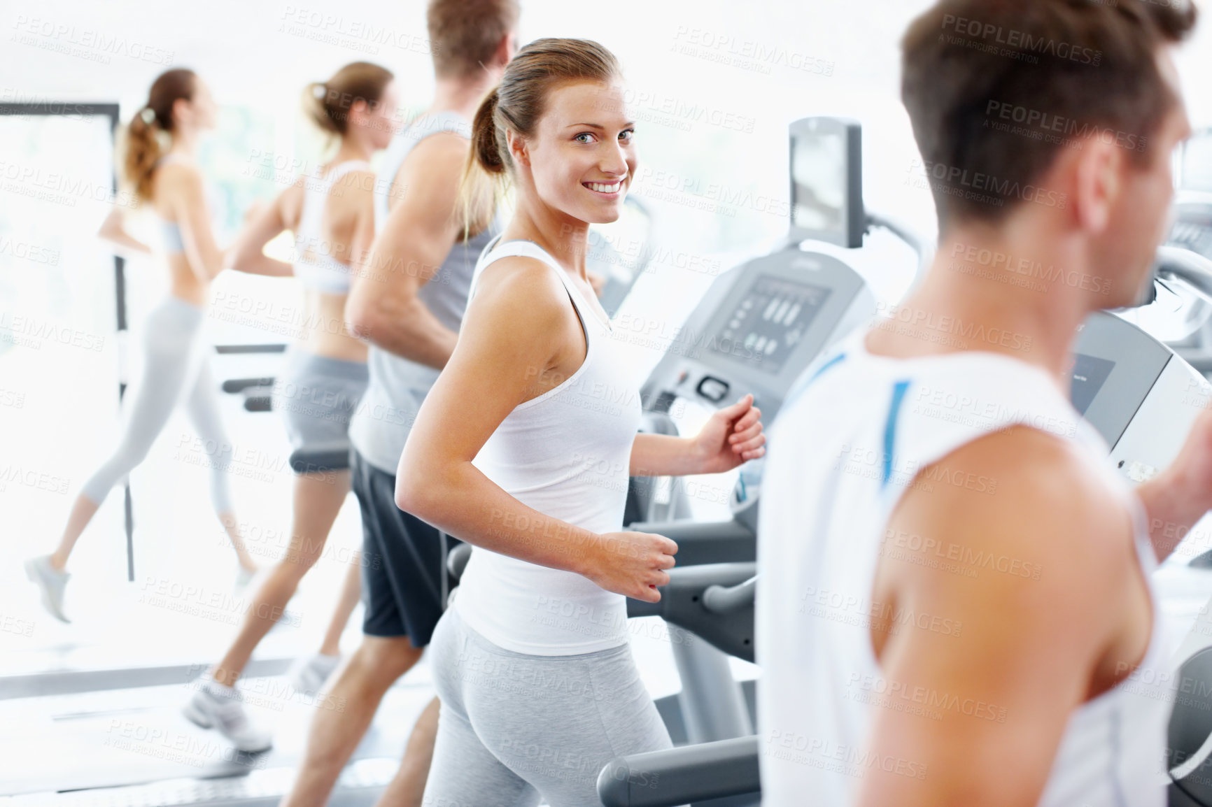 Buy stock photo Portrait, woman and running on treadmill with gym membership, workout or smile for endurance training. Happy, person and jog in health club with equipment, wellness and cardio exercise for fitness.