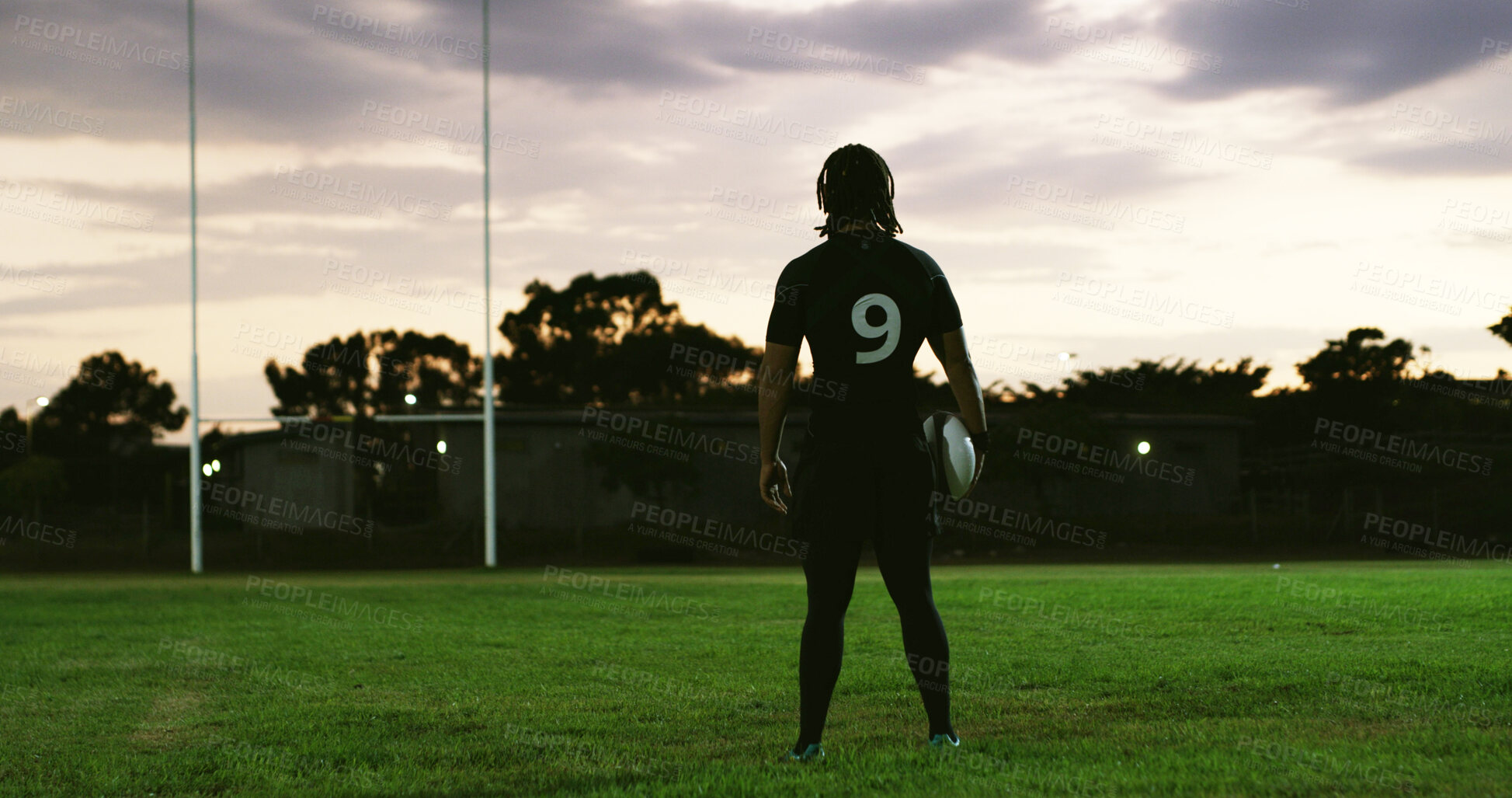 Buy stock photo Rugby, thinking or player on field with ball, goal mindset or daydreaming in fitness hobby. Reflection, back or person with space, athlete insight or performance perspective in collision sport.