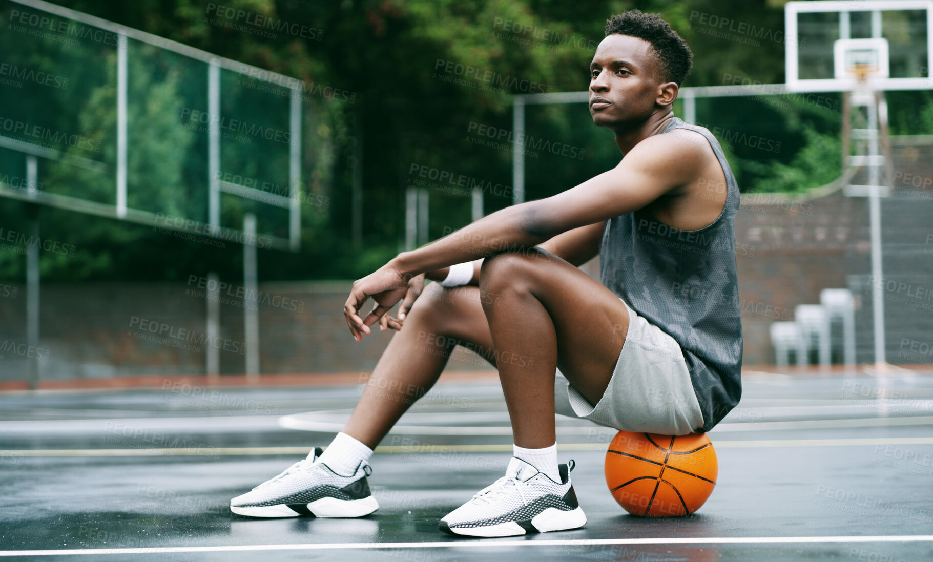 Buy stock photo Thinking, break or black man on basketball court with ball, fitness fatigue or goal mindset in weekend match. Rest, daydream or player with reflection, hoop sport and recovery in training session.