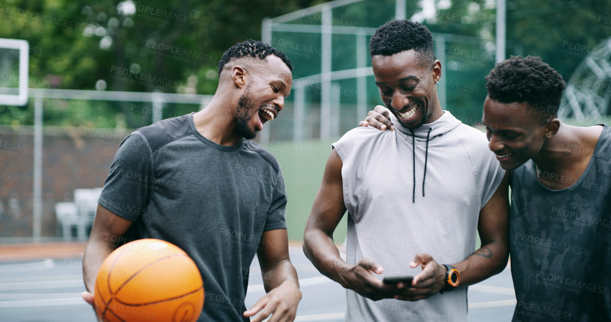 Buy stock photo Fitness, laugh or friends on basketball court with phone, message update or comic post on social media. Smile, athletes and black people with tech, funny chat or meme reaction on training break.
