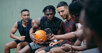 Buy stock photo Basketball, team and talk outdoor with phone, social media video and surprise for skill development. Men, discussion or shock with tech for sports news, practice break or notification for fitness app