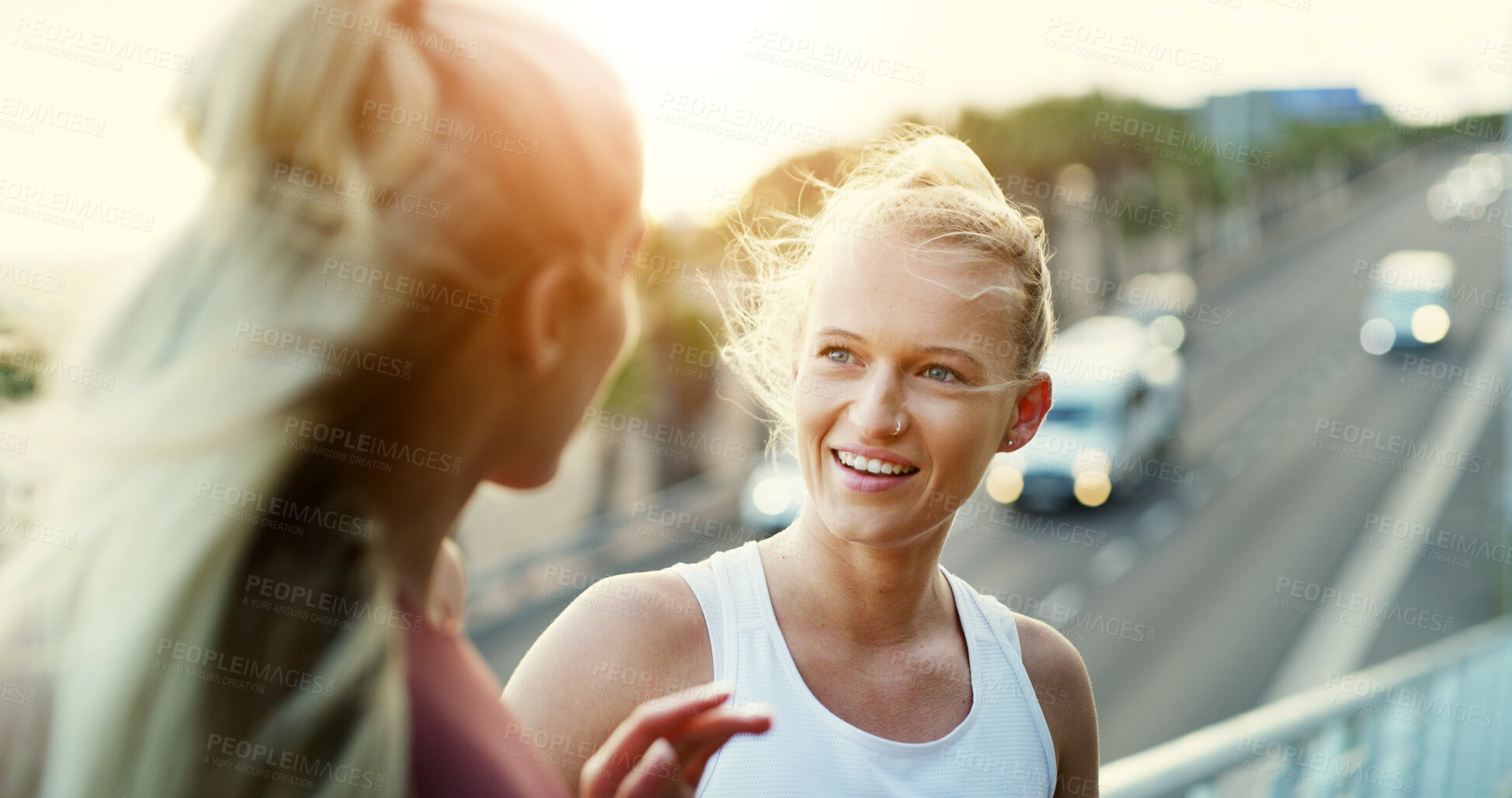 Buy stock photo Happy, talking or women in city for fitness workout, outdoor exercise or training together. Female people, friends or chatting with smile, break or rest on bridge for health, wellness or conversation