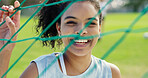 Portrait, net and woman on soccer field for fitness, training and positive attitude for match. Smile, female person and confidence outdoor for football, exercise and practice sports for competition