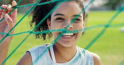 Buy stock photo Portrait, net and woman on soccer field for fitness, training and positive attitude for match. Smile, female person and confidence outdoor for football, exercise and practice sports for competition