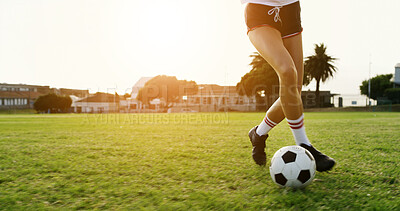 Buy stock photo Woman, legs and training on field with soccer ball, practice skills and fitness for sports performance. Space, person and shoes outdoor on grass with exercise, wellness or technique for football game