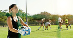 Thinking, woman and team on field for soccer practice, competition preparation and idea for warm up. Fitness, goalkeeper and football for sports training, smile and reflection for skill development