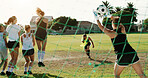 Soccer, women and defense with penalty kick on grass field for sports competition, game or match. Active, female people or football players with goalkeeper, team or net for save on outdoor pitch