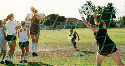 Buy stock photo Soccer, women and defense with penalty kick on grass field for sports competition, game or match. Active, female people or football players with goalkeeper, team or net for save on outdoor pitch
