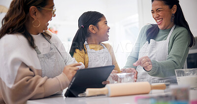Buy stock photo Baking, grandma and family with tablet in kitchen, laugh or research for dessert preparation on web. Mother, online and meal prep with child, people and learning culinary skills with tech in home