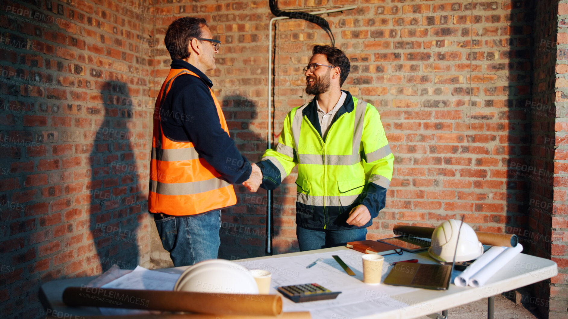 Buy stock photo Happy, handshake and men in meeting on construction site for agreement, compliance and inspection. Team, architecture and people shaking hands for building project, infrastructure and development
