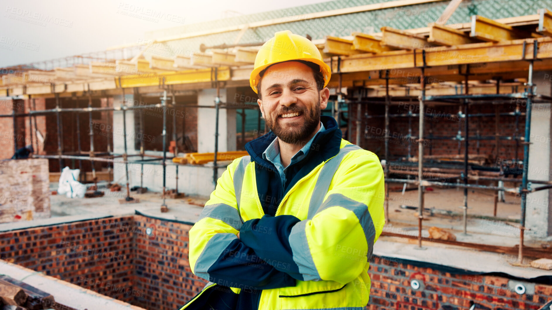 Buy stock photo Portrait, engineering and man with arms crossed, construction site and urban development. Happy, person and employee in city, architecture and pride for infrastructure, safety and remodeling project