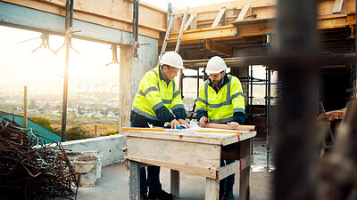 Buy stock photo Construction, architects and talk with blueprint on site for renovation design, strategy or teamwork. Architecture, men and discussion with floor plan for building upgrade, code compliance or outdoor