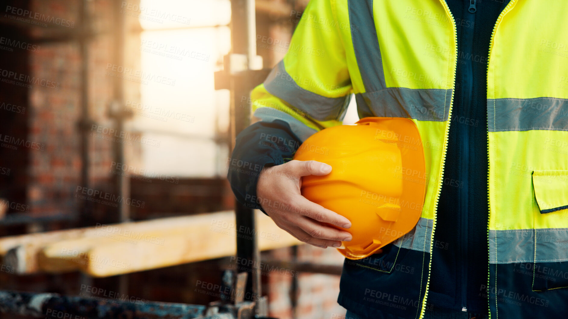 Buy stock photo Person, hands and architect with helmet on construction site for building safety or maintenance. Civil engineer, builder or hard hat with equipment for architecture security or industrial compliance