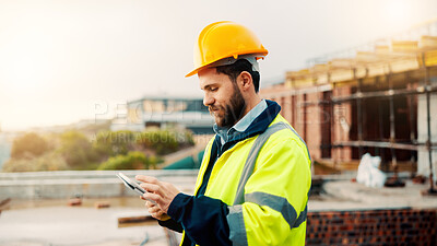 Buy stock photo Construction, message or man on site with tablet, task instruction or inspection report in online chat. Space, review or engineer with tech, project brief or operations planning on digital platform.