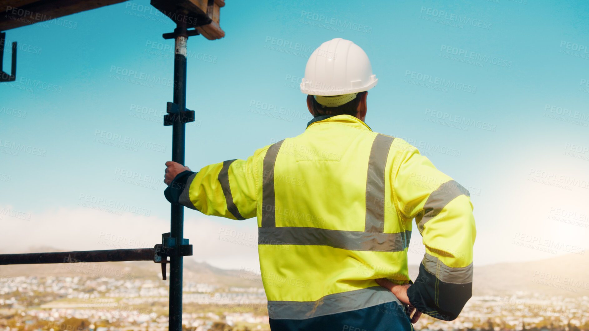 Buy stock photo Planning, man and back of construction worker on site for inspection with building, repairs or maintenance. Outdoor, thinking and male civil engineer with infrastructure for industrial project.