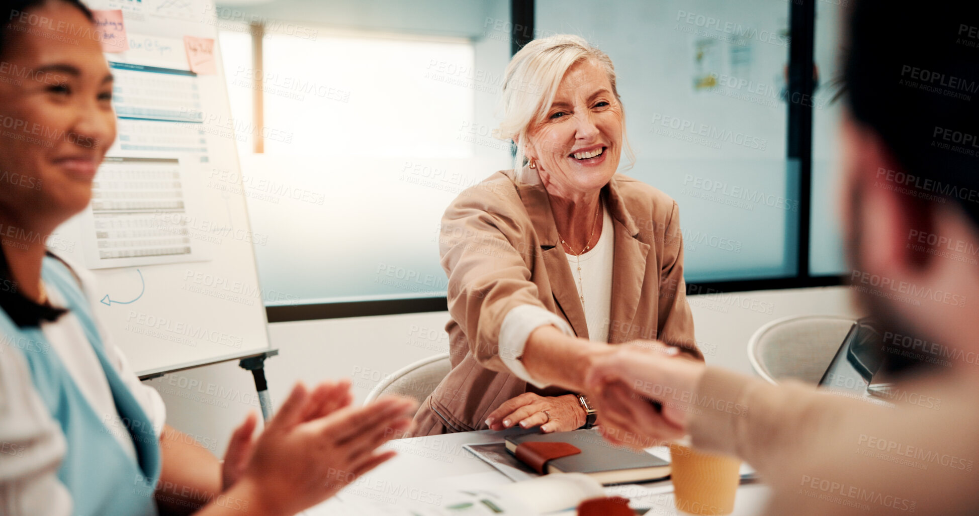 Buy stock photo Meeting, shaking hands and people with applause, success and celebration for investment approval. Manager, partnership and handshake for accountant agreement, congratulations and b2b achievement