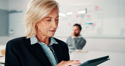 Buy stock photo Serious, businesswoman and research with tablet in office, attorney and reading evidence on website. Law firm, mature lawyer and person with tech for legal review, online and scroll info for lawsuit