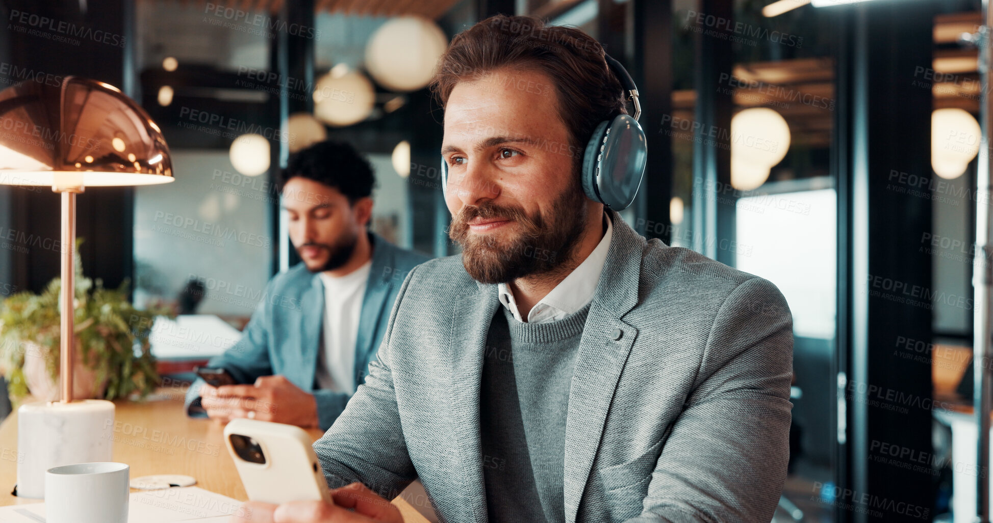 Buy stock photo Businessman, smile and think with headphones in cafe, real estate agent and music choice with phone. Coffee shop, realtor and person with mobile for song selection, reflection and listening to audio