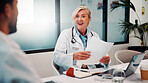 Laptop, documents and doctors in office for research on medical diagnosis, treatment or surgery plan. Computer, meeting and team of healthcare employees with collaboration for procedure schedule.