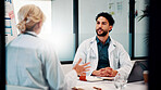 Laptop, conversation and doctors in office for research on medical diagnosis, treatment or surgery plan. Computer, meeting and team of healthcare employees with collaboration for procedure schedule.