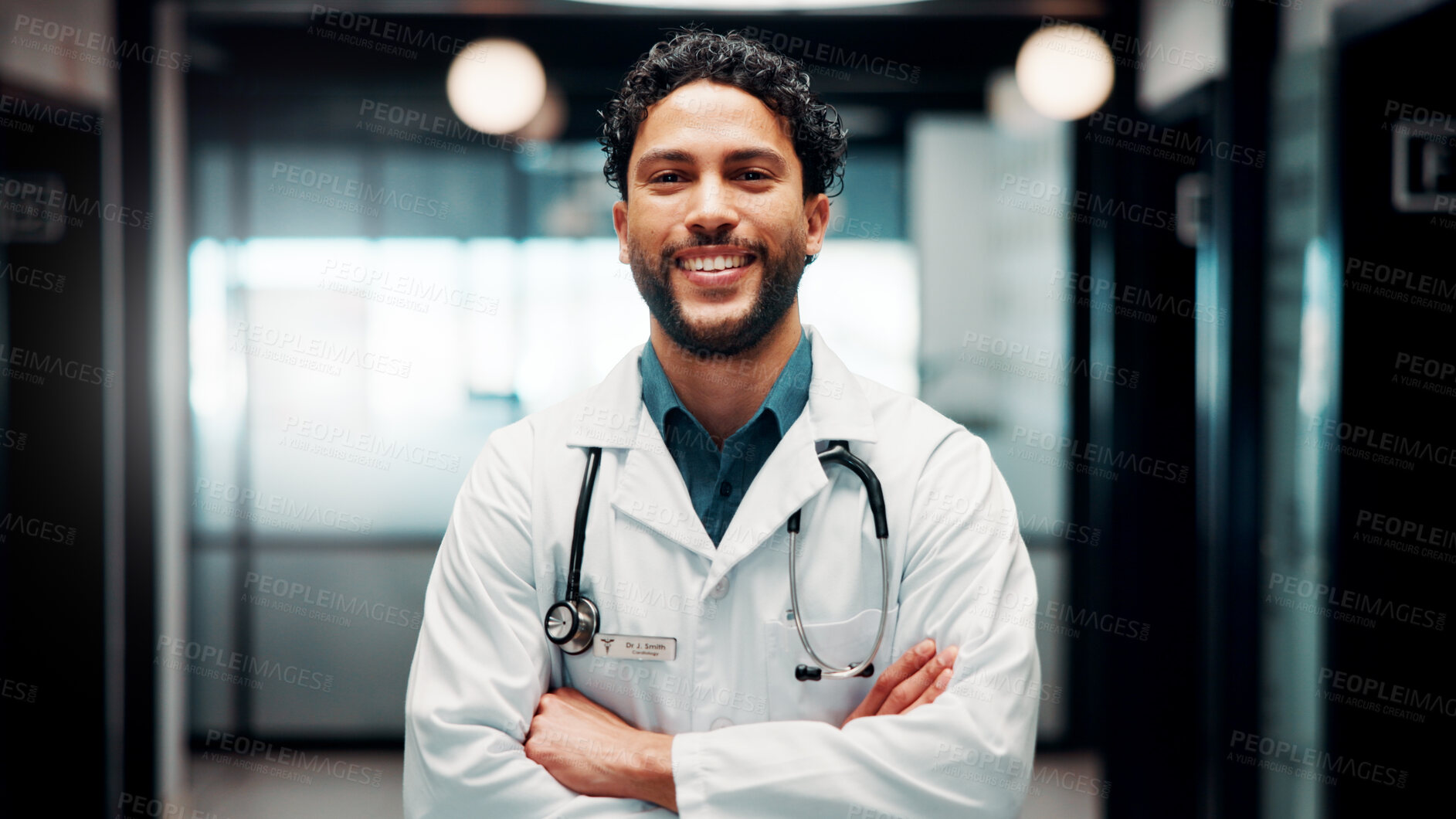 Buy stock photo Portrait, man and doctor with arms crossed in hospital for career pride, about us and medical assistance. Smile, male person and ambition for patient care, positive attitude and healthcare services