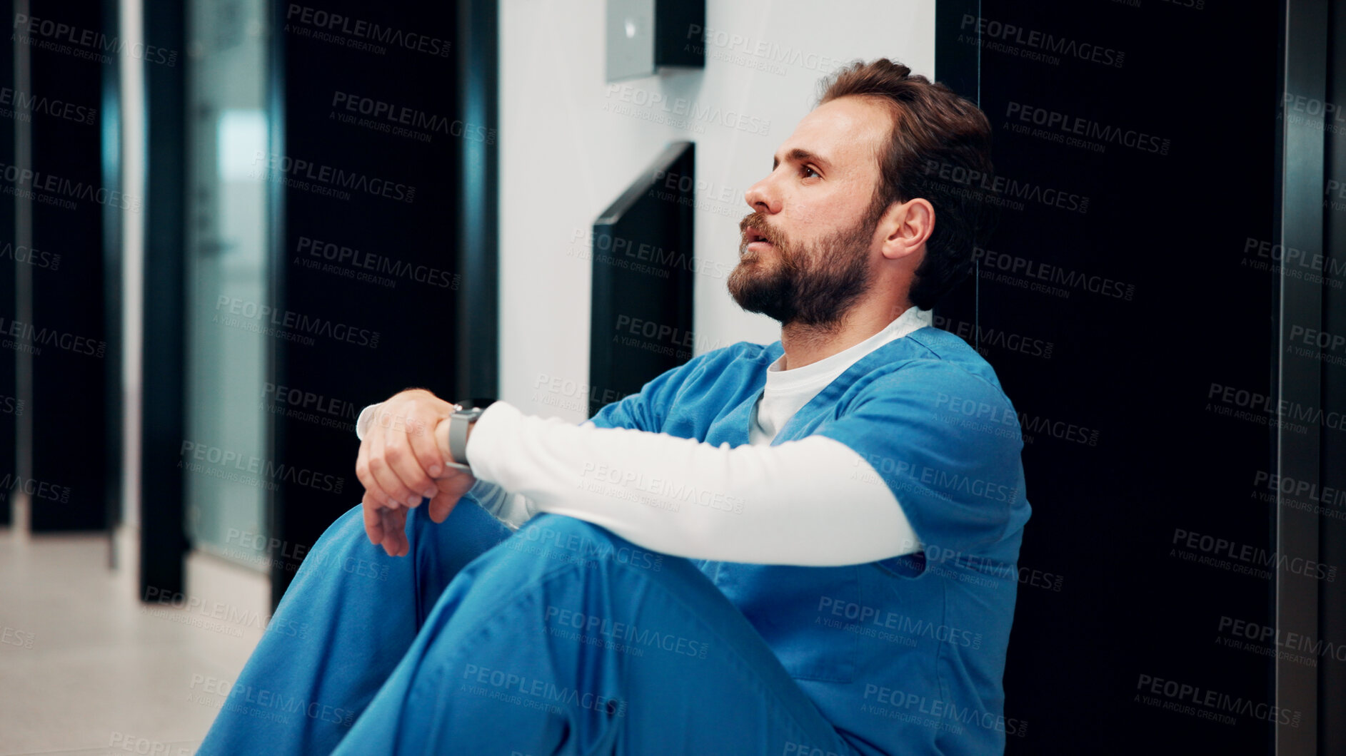 Buy stock photo Stress, doctor and man on floor in hospital with burnout for mistake, surgery fail and patient loss. Healthcare, thinking and person with worry, guilt and reflection for crisis in medical service