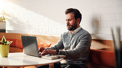 Buy stock photo Businessman, research and typing on laptop in cafe, copywriting and email marketing on social media. Copywriter, online and person with tech for blog post, creative and ad campaign on website in shop