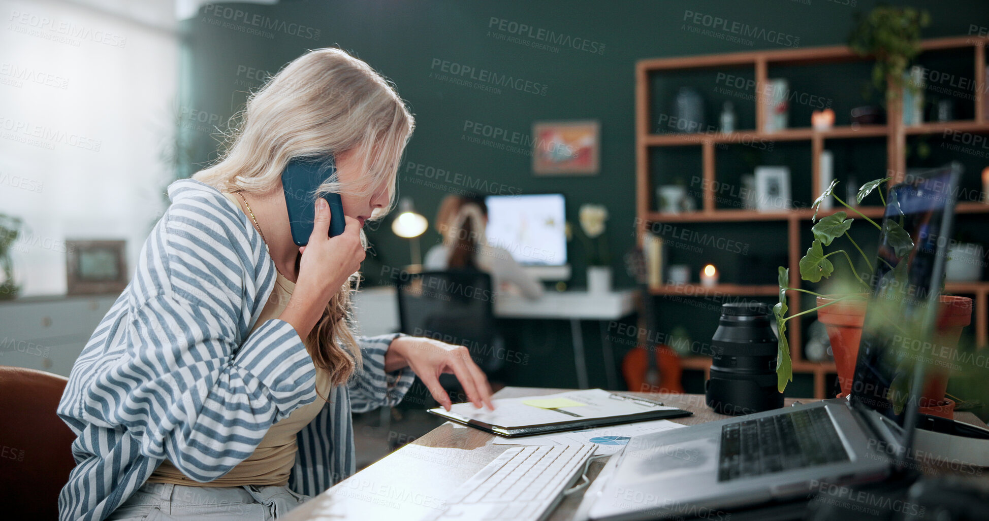 Buy stock photo Woman, document and phone call in office with laptop, marketing analytics and data for ad insights. Coworking, person and contact in creative agency with tech, charts and stats paperwork for project.