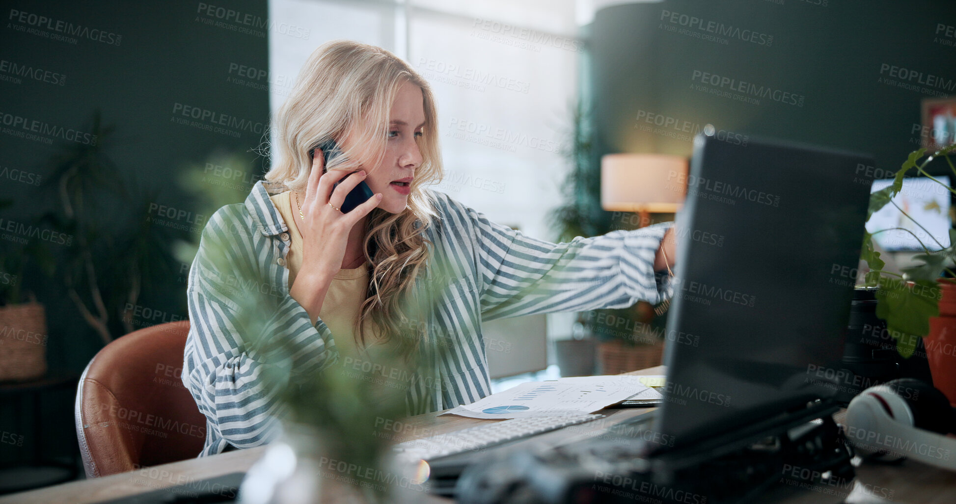Buy stock photo Creative, woman and phone call in office with laptop, review project and research for digital marketing. Female person, tech and conversation in agency with feedback, proposal or advertising campaign