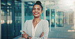 Portrait, business and woman with arms crossed in city, investing opportunity and financial career. Confident, professional and investor with ambition for wealth development, urban town and smile
