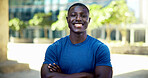 Black man, fitness and happy with arms crossed in city with portrait, pride and wellness in summer. African person, smile and runner in urban town on break, confident or outdoor for exercise in Kenya
