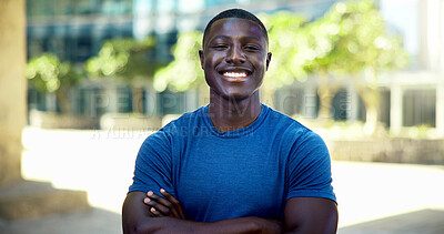 Buy stock photo Black man, fitness and happy with arms crossed in city with portrait, pride and wellness in summer. African person, smile and runner in urban town on break, confident or outdoor for exercise in Kenya