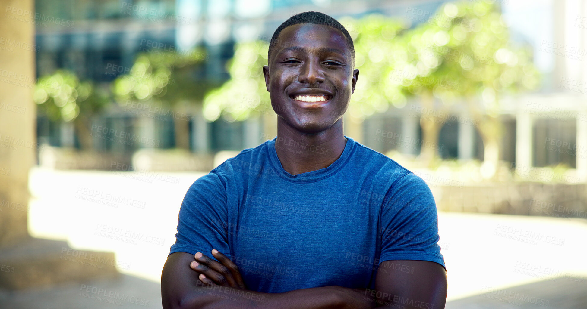 Buy stock photo Black man, fitness and happy with arms crossed in city with portrait, pride and wellness in summer. African person, smile and runner in urban town on break, confident or outdoor for exercise in Kenya