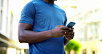 Athlete, texting and hands with phone in city, communication and wellness update on social media app. Typing, message and person with mobile for chat, fitness and scroll health tips on website