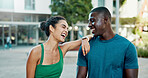 Fitness, support and couple with laugh outdoor for exercise joke, practice break or bonding. Relationship, interracial people or happy in city for cardio recovery, wellness rest or funny conversation