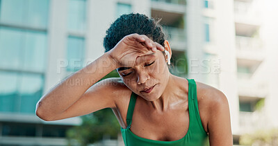 Buy stock photo Sweating, fitness and woman in city with break for exercise, cardio or training for wellness. Tired, athlete and female person with rest in urban town for workout, health or active with sports.