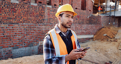 Buy stock photo Civil engineer, thinking and man with phone at construction site, typing and project updates on web. Outdoor, architect and person with mobile for digital report, reflection and safety inspection