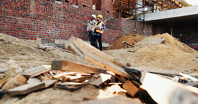 Buy stock photo Team, talking and men with tablet at construction site, civil engineer and project update on website. Outdoor, architect and people with tech for property development, inspection or quality assurance