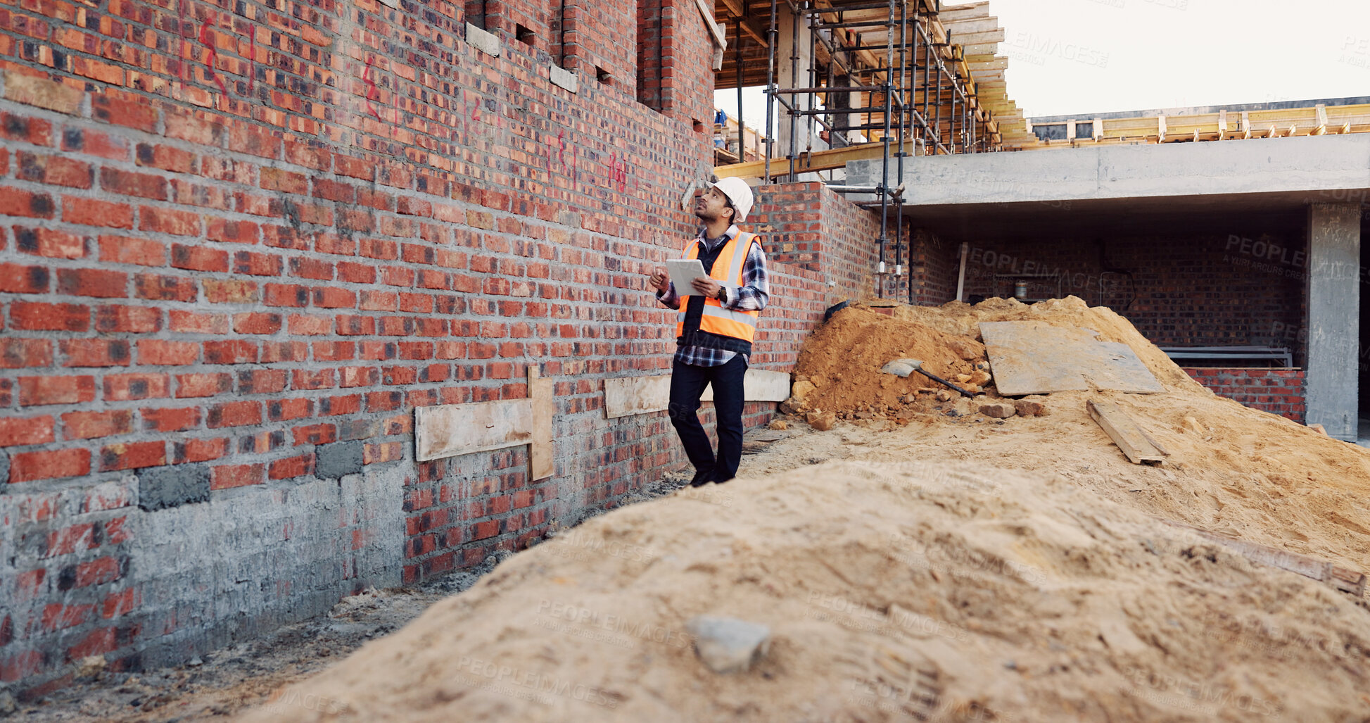 Buy stock photo Building, inspection and man with tablet at construction site, architecture or project update on web. Outdoor, civil engineer and person with tech for property development, report and quality control
