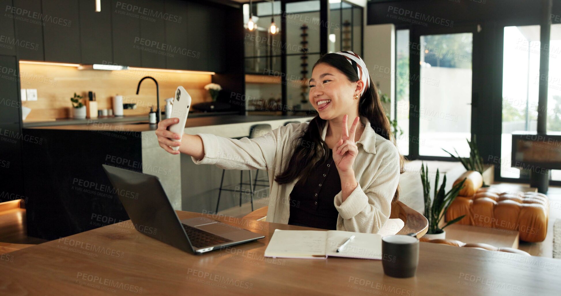 Buy stock photo Creative, home and woman with funny face for selfie, content creation and sharing moment on website. Influencer, remote work and Asian person with smile for picture, photography and memory in house
