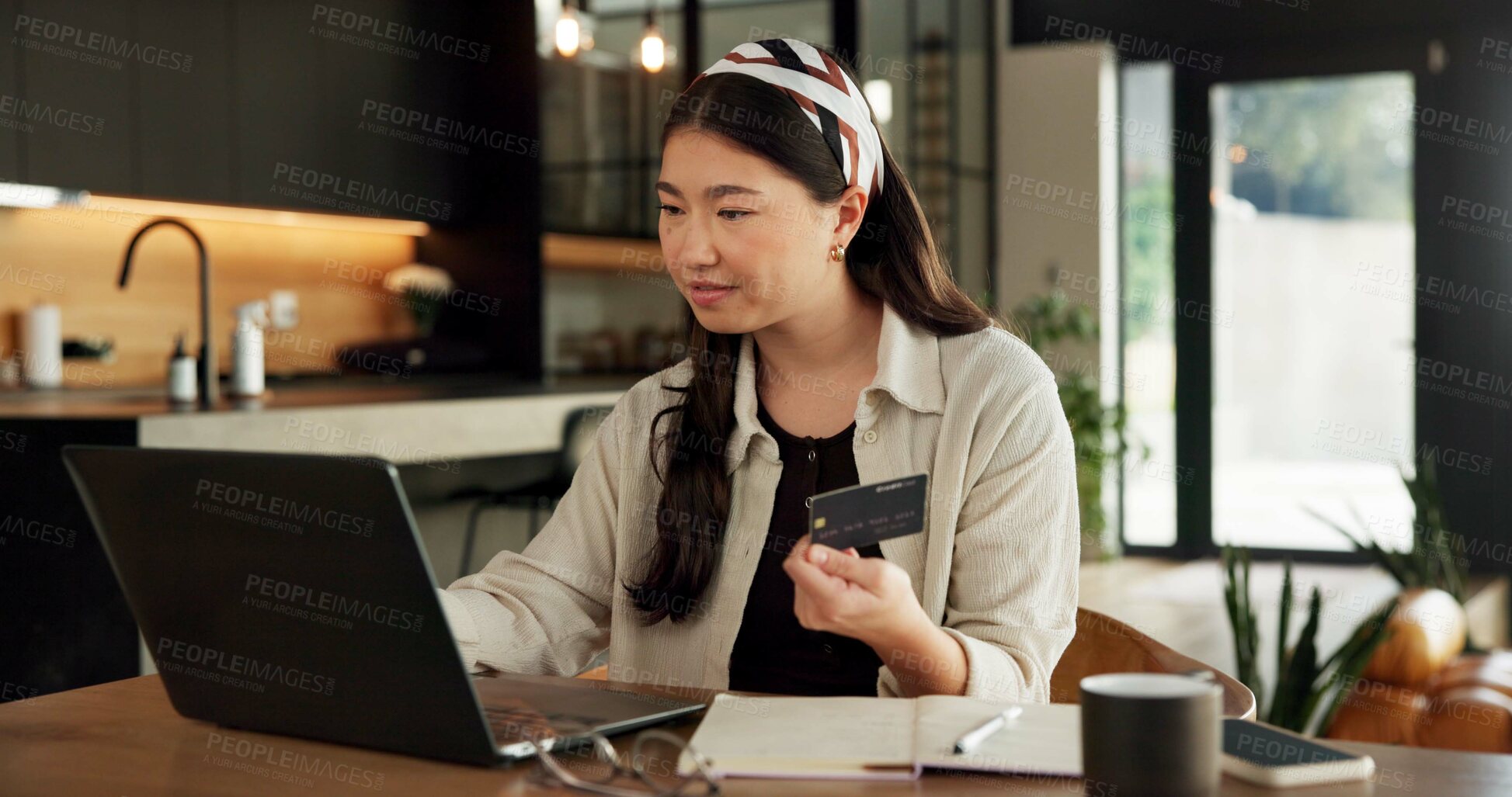 Buy stock photo Woman, laptop and credit card with online shopping in home with easy payment, bills or budget. Asian person, computer and digital banking with fintech, finance website and e commerce in apartment