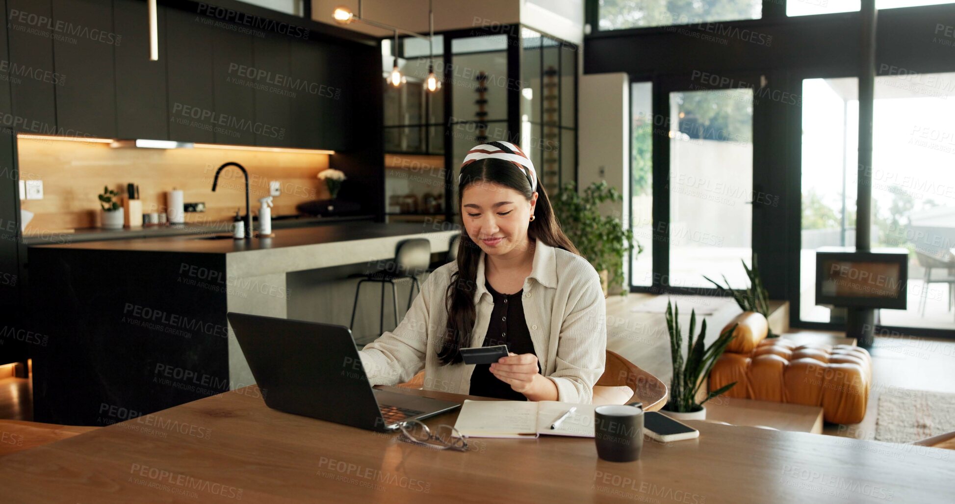 Buy stock photo Woman, laptop and credit card with e commerce in home with easy payment, bills or budget. Asian person, computer and digital banking with fintech, finance website and online shopping in apartment