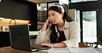 Freelancer, burnout and woman with laptop in house, fatigue or research for logo design inspiration. Unhappy, graphic designer and Asian person with tech for ideas, remote work and bored by project